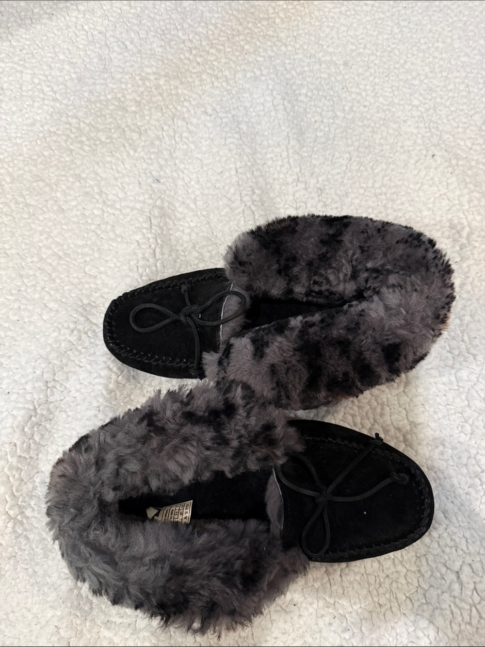 Ugg Women’s Black Faux Shearling Moccasin Slippers